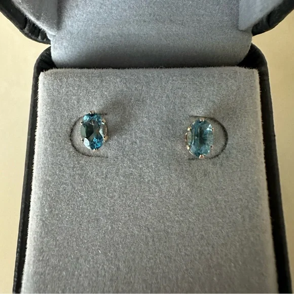 14k Solid Gold Blue Topaz Oval Post Earrings - Picture 3 of 13